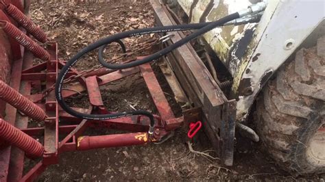 snow plow mount for skid steer|homemade skid steer snow plow.